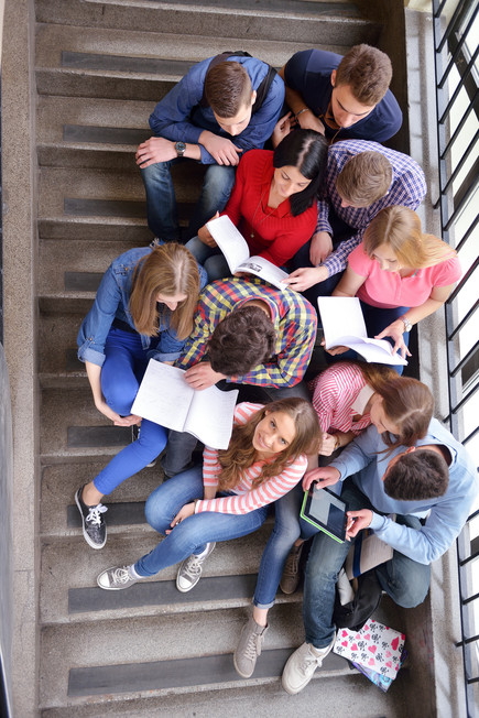 Students Studying on Stairs