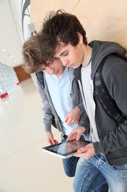 Two Boys using a Tablet